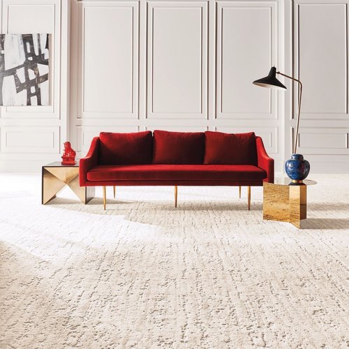 red sofa on beige carpet floor from Touchdown Carpet & Flooring Inc in Marlborough, MA